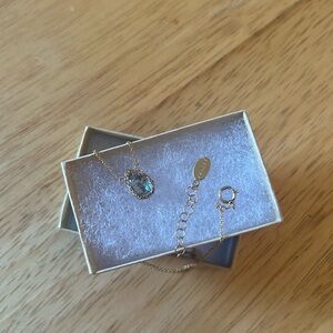 Gold Necklace with Blue Gemstone